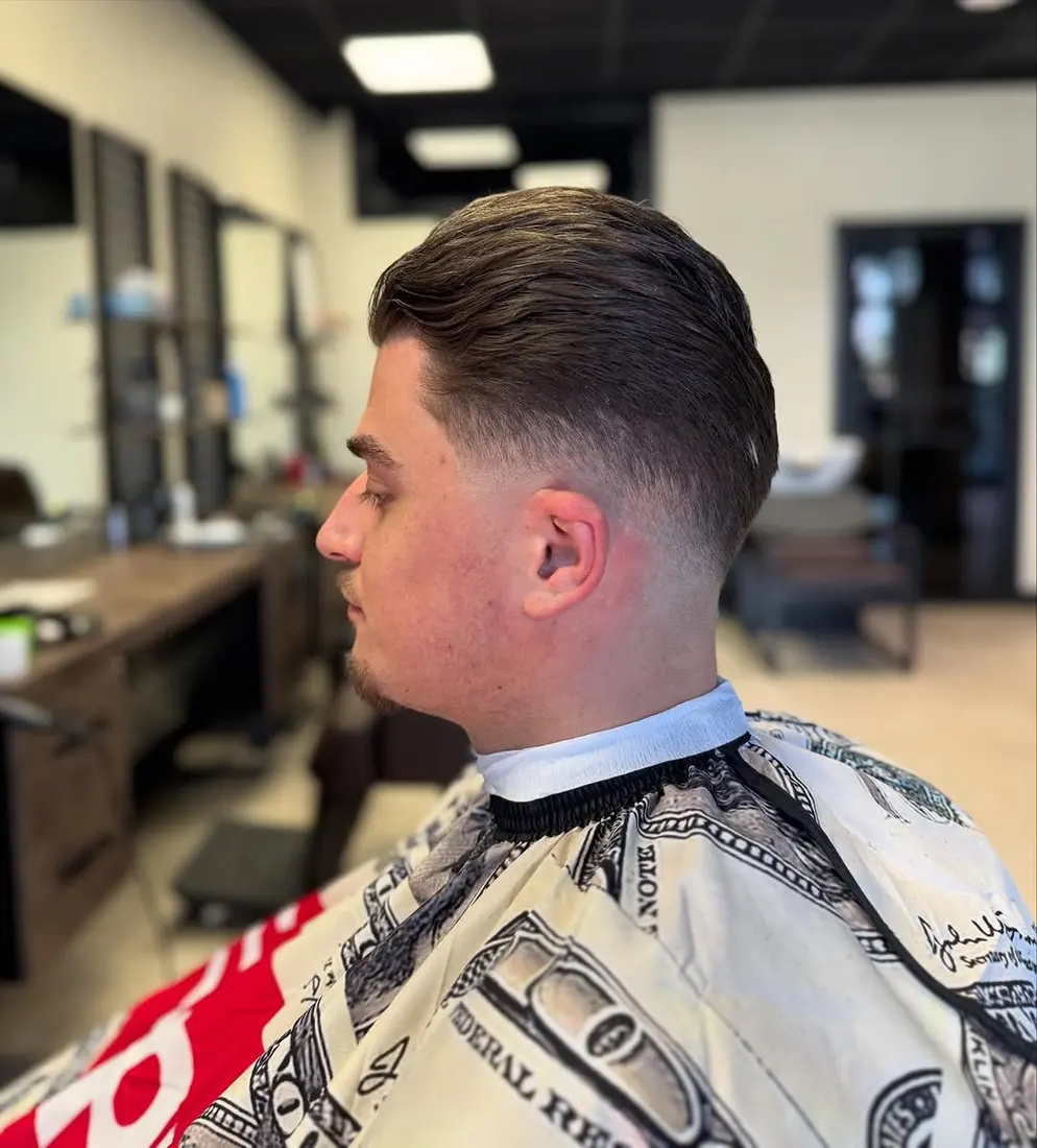 Strak herenkapsel bij Barbier Bruintje